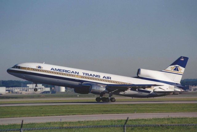 Lockheed L-1011 TriStar (N194AT) - Departing 23-L. Scanned from a print.