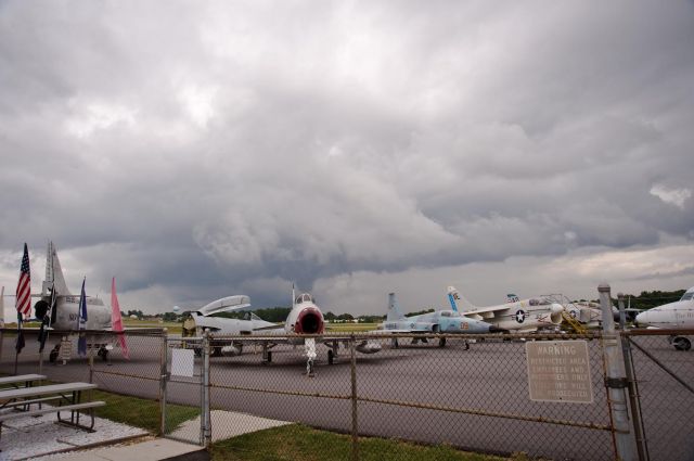 — — - Old Warriors @ the Hickory Aviation Museum/KHKY rest peacefully in the calm before the storm as turbulent weather moves through the Catawba Valley. 12.Jul.2010