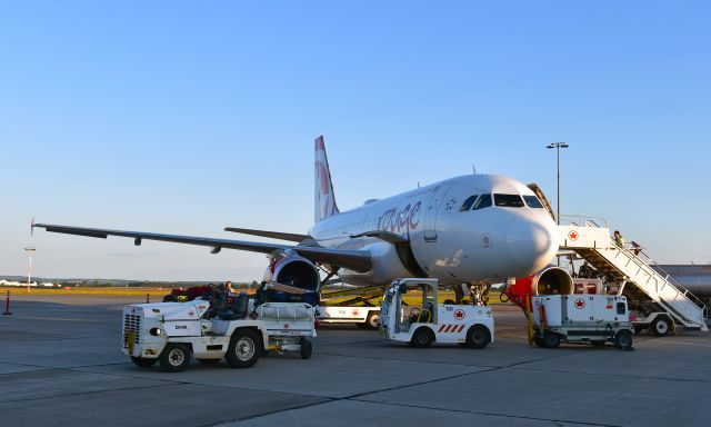 Airbus A319 (C-FYNS) - Air Canada Rouge Airbus A319-114 C-FYNS in Charlottetown 