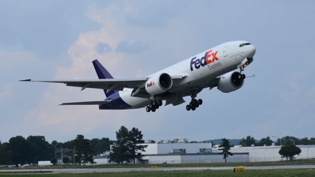 BOEING 777-200LR (N840FD) - N840FD doing touch and go's at Huntsville Intl Airport. 6/11/2021