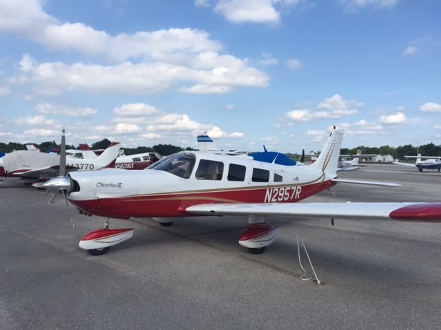 Piper Saratoga (N2957R) - I happened to be parked to my old Six... it has been beautifully updated since I sold it 20 years ago! Glad to see it being well cared for.