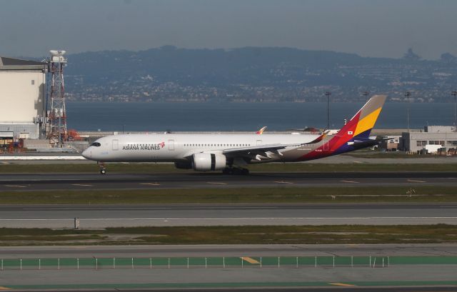 Airbus A350-900 (HL8360) - KSFO - 20 FEB 2023 Airbus arriving from Inchon Korea rolling out on 28R. This was a few of the A350s I was able to get on film while in the area, I have no idea what the 2 "1960s Outer Limits" type monsters are up on the ridgeline above the eastbay. Must be a camera digital glitch as in other photos the monsters are not there.