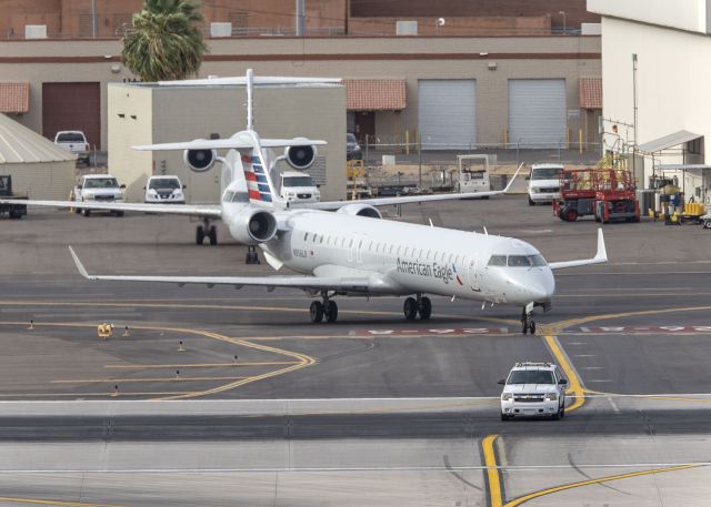 Canadair Regional Jet CRJ-900 (N956LR) - The plane was moving from Mesa Airlines MX facility to the gate. 