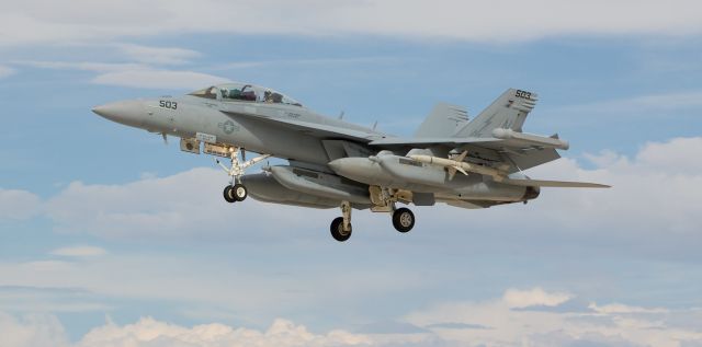 McDonnell Douglas FA-18 Hornet (16-8379) - An EA-18G Growler of the VAQ-133 "Wizards" approaches runway 31L at NAS Fallon.  Not only is this the first picture of 168379 to be posted into the FA gallery, but (according to the data indicated below) it is also the very first photo of a Growler to be presented.  ** That data must be erroneous.  I find it extremely improbable that in a gallery as huge as FAs, there is no earlier post of an EA-18G so over the next few days Ill try going back thru all the previous Super Hornet posts; there HAS to be a shot of a Growler (probably accidentally mislabeled as a Super Bug).  If I find one, Ill pass it on.