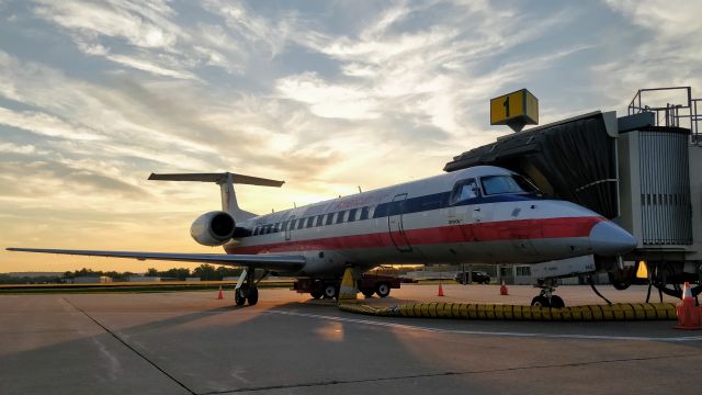 N842AE — - June 2nd, 2020. This tired looking E-140 is one of two remaining at Envoy in the old color scheme. I caught her basking in the sunrise, awaiting departure to Dallas as AA3431. 