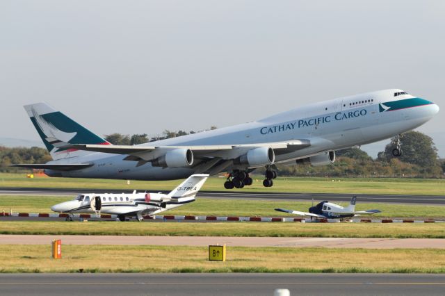 Boeing 747-200 — - Captured just after rotation, a Cathay Pacific Cargo B747-400LCF seen departing runway 23L at Manchester Airport.