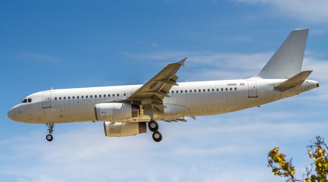 Airbus A320 (HI968) - The first Dominican registered aircraft Ive ever seen at YYZ. This one leased to Cubana and landing on runway 05 as CUB191. "Dominican Wings" can just be made out on the upper fuselage.