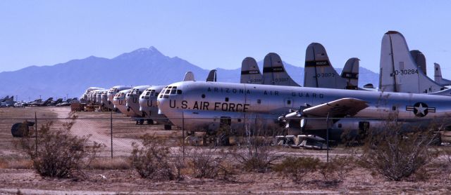 Boeing C-97 Stratofreighter — - Davis-Monthan AFB, Tucson, AZ, March 1975.  A few of the 6000 or so aircraft on this base.  In this case, what is left of several Arizona Air Guard C97's.