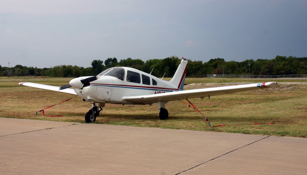 Piper Cherokee (N2164G) - Sitting out the summer thunderstorms at KGVT on August 8, 2012.