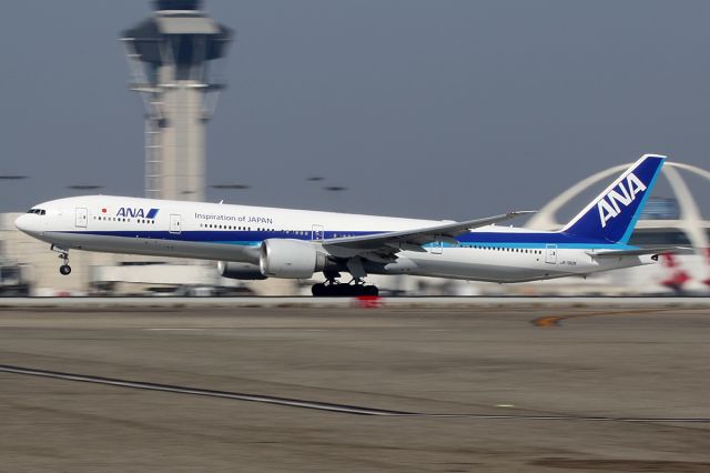 BOEING 777-300ER (JA780A) - Takes off.