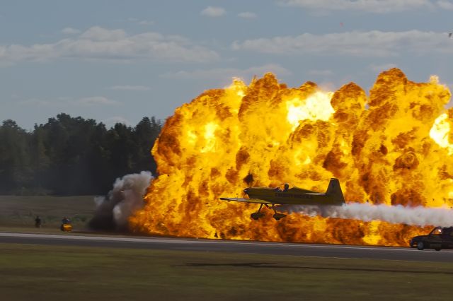 Experimental  (N580GP) - N580GP - Mudry Eagle 580 (CAP 231EX) - Matt Chapman Airshows LLC - KFFC - this shot was pure luck - the Eagle was racing the jet truck. I was just following the aircraft - and the unexpectedly the PYROTECHNICS ! According to the announcer (Scott Slade) - the jet truck set a ground speed record of 365MPH. Great Georgia Airshow.