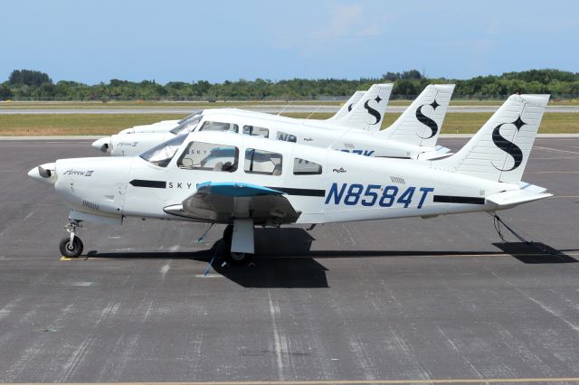 Piper Cherokee Arrow (N8584T) - 04/05/2022:  A Piper Arrow on the ramp Vero Beach a/p.