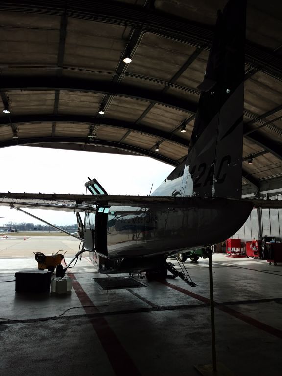 Cessna Caravan (N942AC) - The aircraft getting a little maintenance in the ACO hangar.