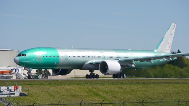 BOEING 777-300 (F-GZNQ) - BOE36 begins its takeoff roll on Rwy 34L for its B1 flight on 4/16/15. (ln 1298 / cn 40064).