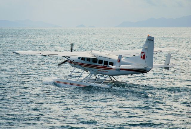 Cessna Caravan (VH-PGA) - End of day departure for Air Whitsundays Cessna 208 Caravan. Leaving Hayman Island, Qld for its base on the mainland approx 19nm away.