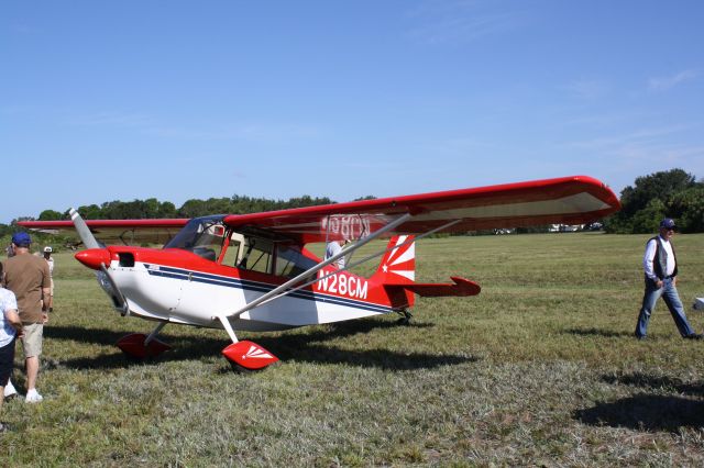 STODDARD-HAMILTON Glasair (N28CM) - American Champion Citabria (N28CM) flies over Buchan Airport