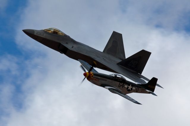 — — - Thunder Over Utah 2012 at the new St. George Airport. The F-22 Raptor and P-51 Mustang in the Heritage Flight.