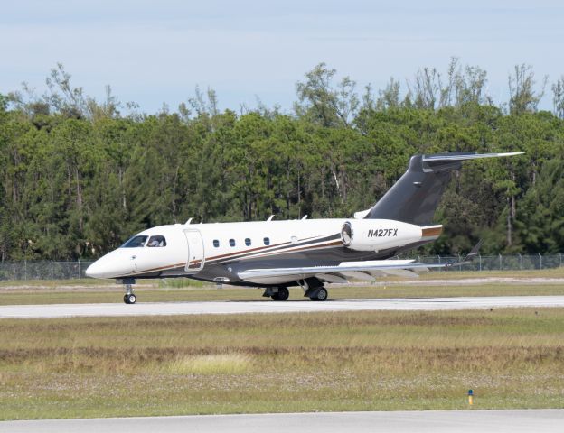 Embraer Legacy 450 (N427FX) - roll out runway 23