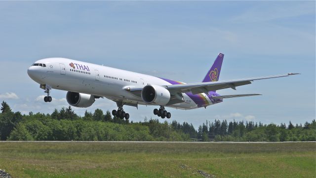 BOEING 777-300 (HS-TKO) - BOE275 on final approach to runway 34L on 6/5/13. (LN:1107 cn 41524).