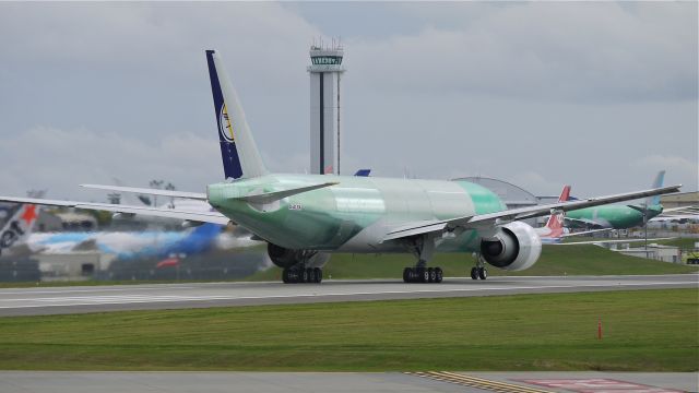 Boeing 777-200 (D-ALFA) - BOE156 during its takeoff roll on Rwy 16R for its maiden flight on 9.23.13. (LN:1144 cn 41674).  This will be the first B772 for Lufthansa Cargo.