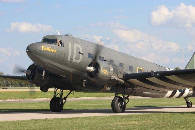 Douglas DC-3 (N74589) - On the taxi in front of the flight line...........