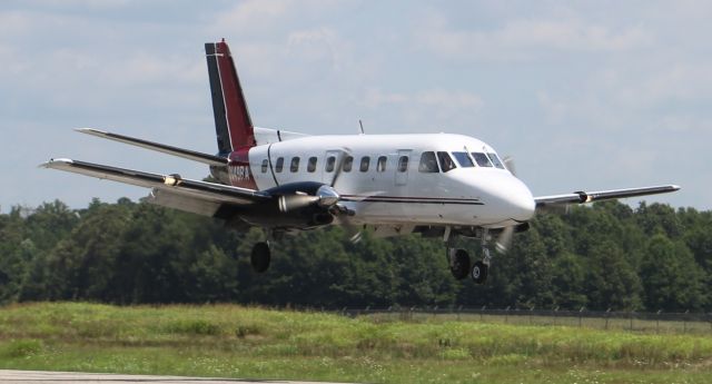 Embraer EMB-110 Bandeirante (N49RA) - A Royal Air Freight Embraer EMB-110-P1 Bandeirante arriving Pryor Field Regional Airport, Decatur, AL via Runway 18 around mid-day June 26, 2018.