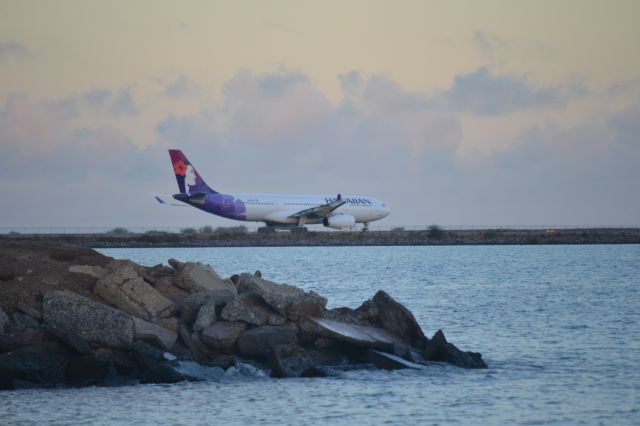 Airbus A330-300 — - Hawaiian A330-200 taxing out to reef runway at PHNL.