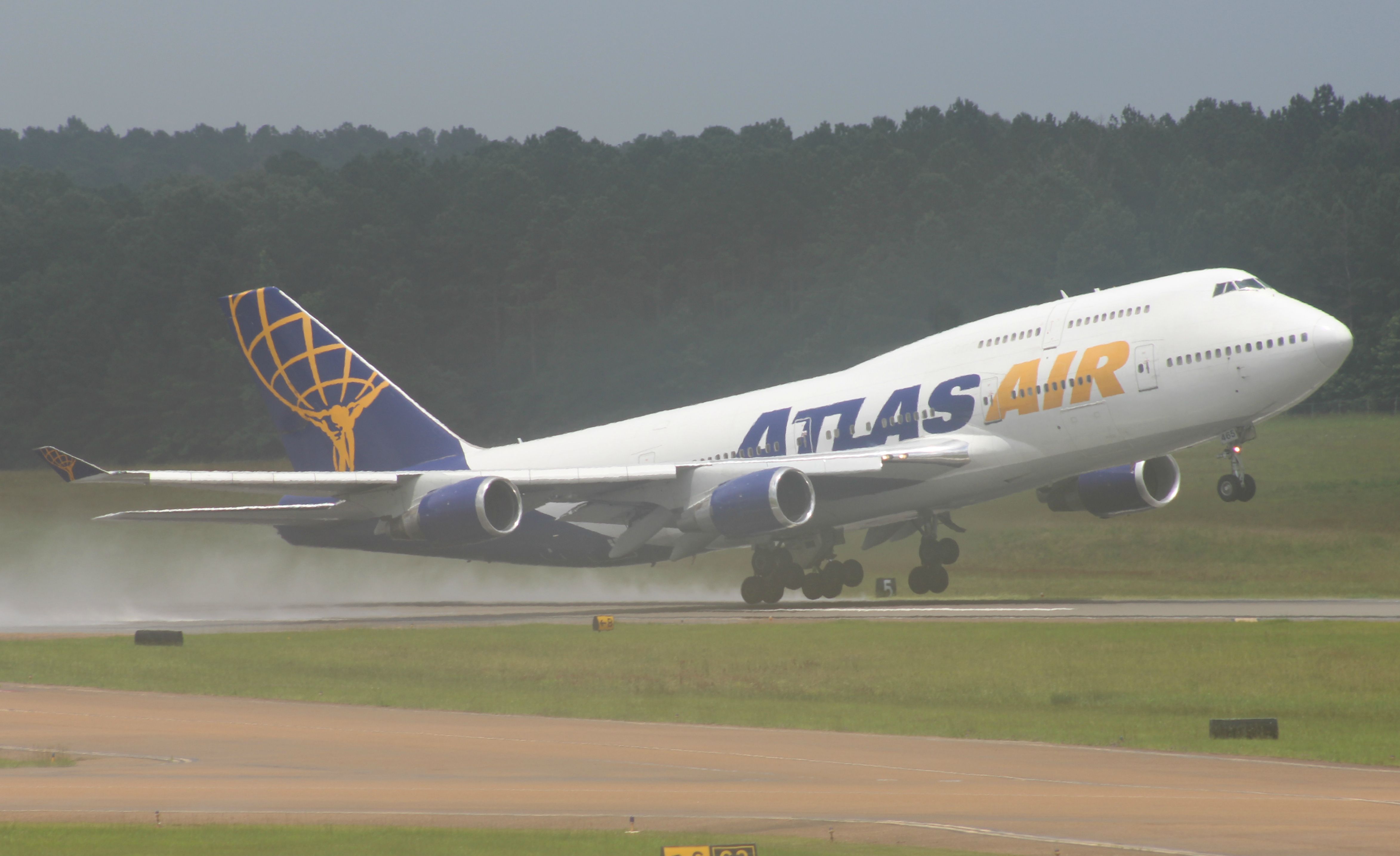 Boeing 747-400 (N465MC) - WOW! A Giant came by to say hello to this small, and rainy, airport! (Im sorry for the fogginess, it was very rainy.)