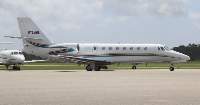 Cessna Citation Sovereign (N131GM) - A Cessna C680 Citation Sovereign taxiing along the Gulf Air Center ramp at Jack Edwards National Airport, Gulf Shores, AL - June 29, 2017. 