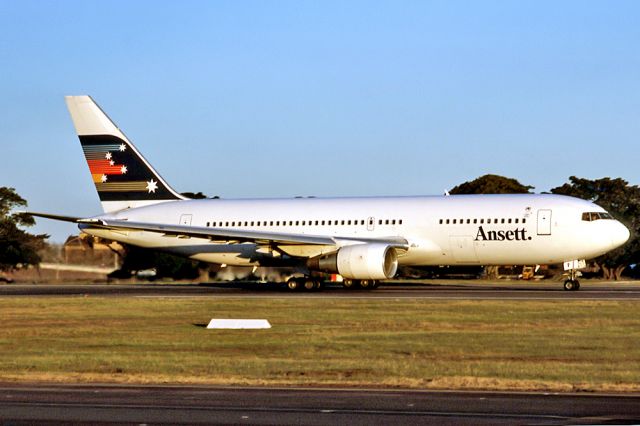 Cessna Skylane (VH-RMF) - ANSETT AIRLINES OF AUSTRALIA - BOEING 767-277 - REG : VH-RMF (CN 22694/32) - KINGSFORD SMITH SYDNEY NSW. AUSTRALIA - YSSY 28/6/1988 35MM SLIDE CONVERSION USING A LIGHTBOX AND A NIKON L810 DIGITAL CAMERA IN THE MACRO MODE.