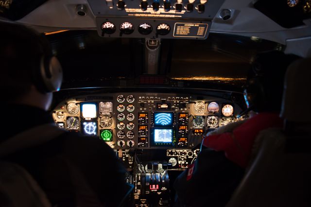 Beechcraft Super King Air 200 (BXH151) - Enroute from CYXH to CYYC at 20,000 ft.  You can see the city lights in the distance. Two crew air ambulance flight.  br /D800 at 24mm taken with tripod