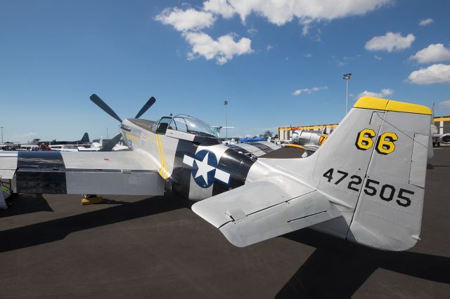 North American P-51 Mustang (VH-FST) - P-51D of Fighter pilot siting on the apron at the 2016 Careers Expo