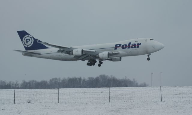 Boeing 747-400 (PAC987) - Takin on Sat Dec 4, we had a front come through the area and droped about 2 inchs of snow Polar 987 Heavy landing on 36R,    thanks to a very nice person at the airport i was able to be alittle closer to the runway for some great shots    i can be reached at Truck10FMFD@aol.com for coments