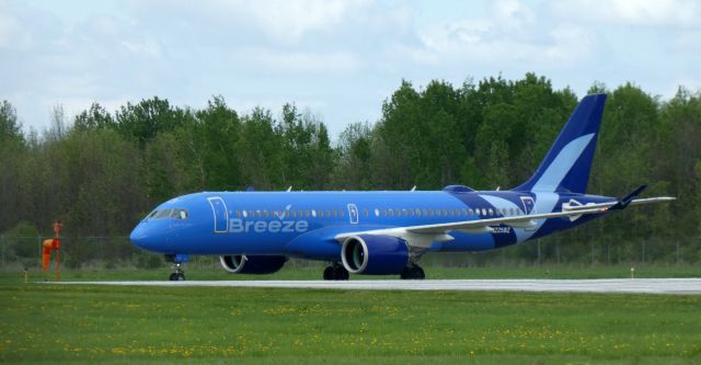 Airbus A220-300 (N225BZ) - Taxiing to parking is this 2023 Breeze Airways Airbus 220-300 in the Spring of 2025.