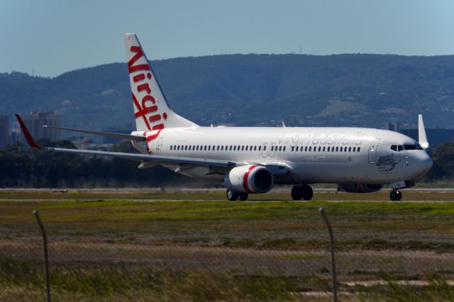 Boeing 737-800 (VH-YIM) - On taxiway heading for take-off on runway 05. Monday, 14th April 2014.