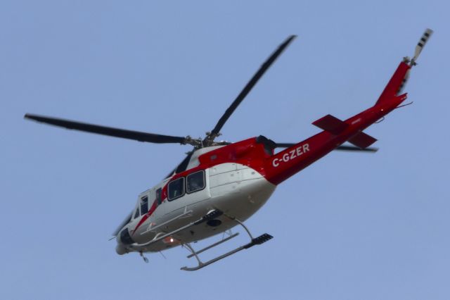 Bell VH-1 (C-GZER) - C-GZER Bell 212 Canadian Helicopters. Altitude 454 Mètres Vitesse 257 KM/H. Survolant le fleuve St-Laurent à Lavaltrie QC. Le 26-03-2025 à 15:40.