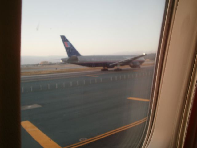 Boeing 777-200 (N213UA) - at KSFO on taxi to take-off on June 9, 2011
