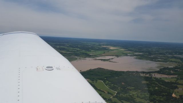 Piper Cherokee (N2833D) - Flood waters of north Tx, after receiving 200% of their monthly precipitation.