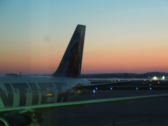 Airbus A319 (N933FR) - Preparing for an early morning departure to DEN.