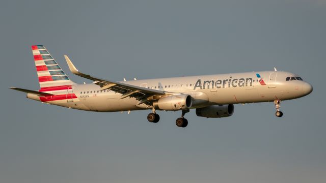 Airbus A321 (N143AN) - Taken May 3 at Founders Plaza at Dallas Fort Worth International Airport around sunset.