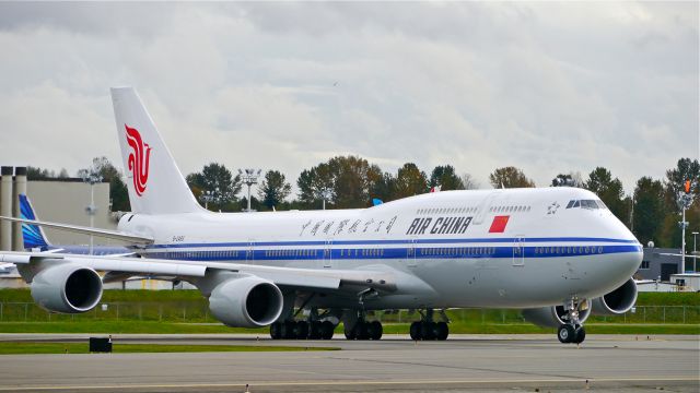 BOEING 747-8 (B-2486) - BOE67 taxis onto Rwy 16R for a fast taxi / brake test on 10/20/14. (LN:1507 / cn 41192)