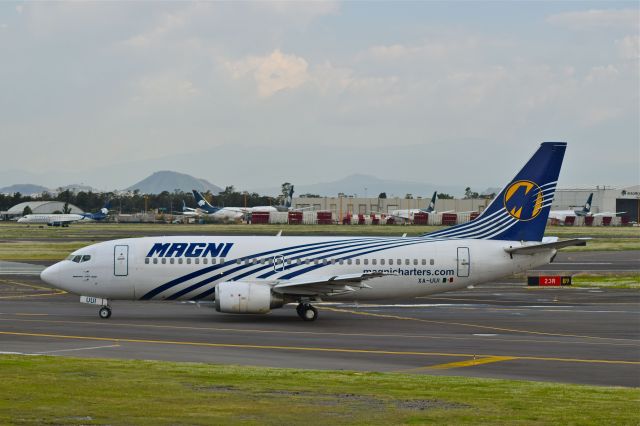 BOEING 737-300 (XA-UUI) - Boeing B737-3K2 XA-UUI MSN 28085 of Magnicharters taxiing for take off from Mexico City Airport (07/2018).