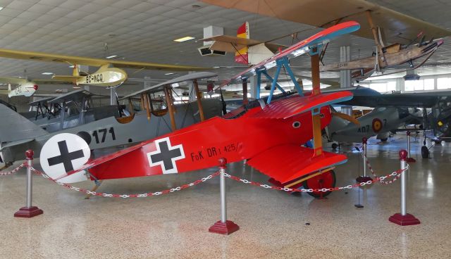 — — - Replica of Red Baron's Fokker DR-1 at Museo del Aire, Madrid, Spain.