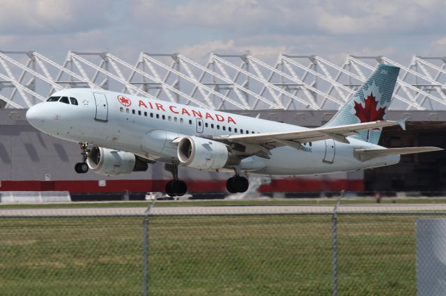 Airbus A319 (C-GBIK) - Departing on runway 24L