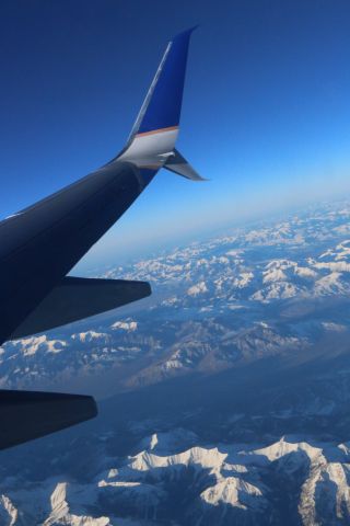 Boeing 737-700 — - New wings for the newer Boeing jets. Much larger than they appear. This photo at cruising altitude about 2 hours out of SEATAC on the way to Houston. (IAH)?