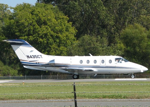 Beechcraft Beechjet (N435CT) - Taking off on runway 14 at Downtown Shreveport.