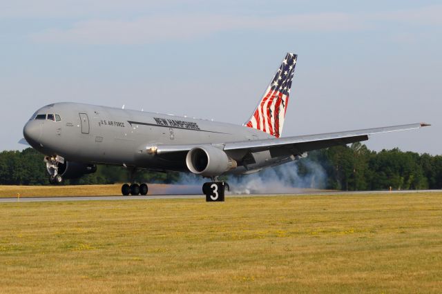 Boeing KC-46 Pegasus (PACK91) - Arriving with a new tail paint scheme and smoking the tires