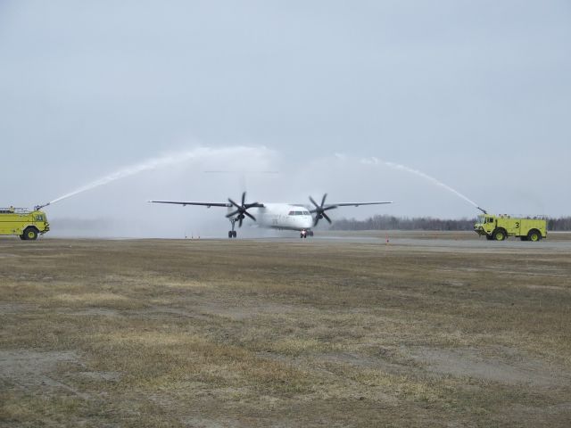 C-GLQE — - Porter Airlines DHC-8 Q400 inaugural flight to CYSB. Greeted by Red 2 and Red 3.