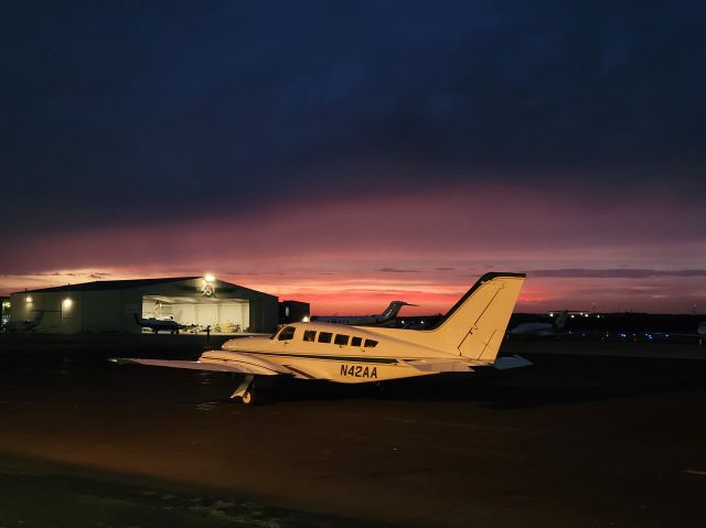 Cessna 402 (N42AA) - Sunset photo over the north ramp, Hyannis KHYA. 