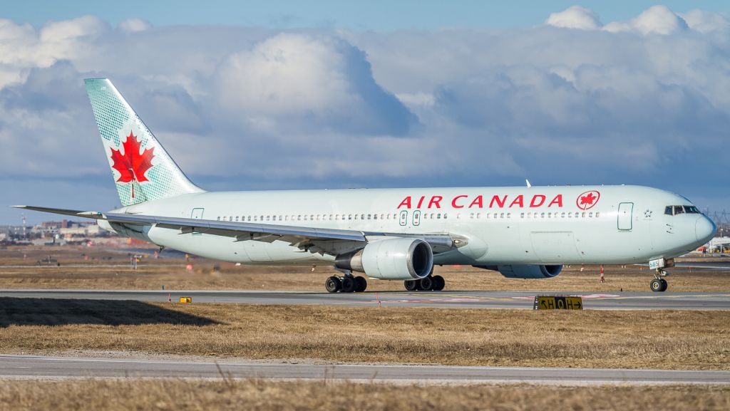 BOEING 767-300 (C-GHOZ) - AC9 gets ready to depart to Calgary